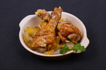 Roasted chicken legs with potato