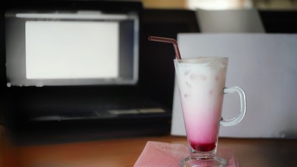 A glass of milkshake on table 