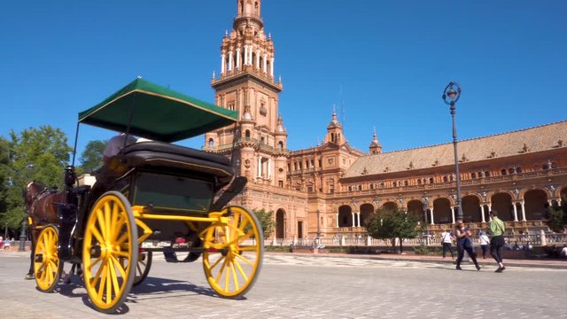 Horse Carriage at Spain Square in Seville, Plaza de Espana, on a beautiful sunny day. Seville, Spain .