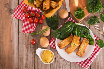 Potato croquettes with spinach and mozzarella. 