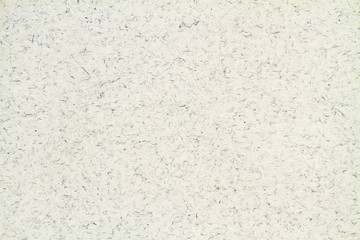 Light grey or white villus or fiber paper. Closeup