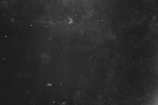 Dust and scratches design. Distressed photo editor layer. Black abstract background. Copy space.