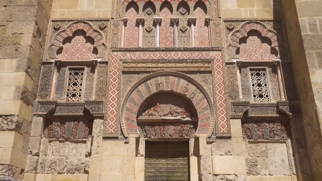 Tilt shot of door and facade of the Mosque of Cordoba, Andalucia, Spain . 