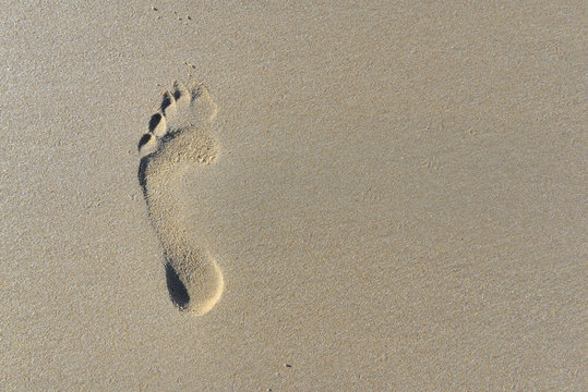 top view on footprint in the sand