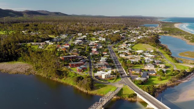 Areal drone shot of the river estuary bridges and town Scamander Tasmania