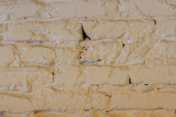 old white textured brick wall 