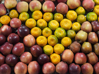 Oranges and red apples on the market. Kochi, Kerala