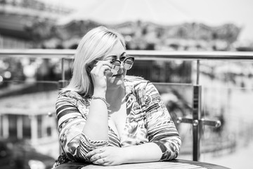 Simple plump woman at city. Lady in cafe rest and enjoy 