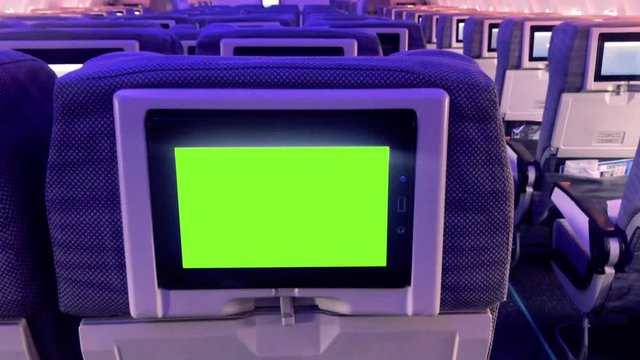 Green Screen in the Aircraft Cabin. Zoom In. You can Replace Green Screen with the Footage or Picture you Want with “Keying” Effect (Check out Tutorials in Internet).