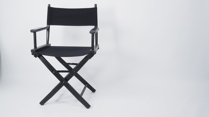Black director chair use in video production or movie and cinema industry. It's put on white background.