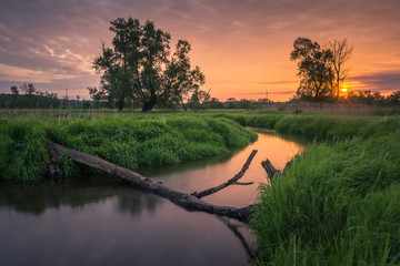 Sunset over the Jeziorka river near Piaseczno, Masovia, Poland