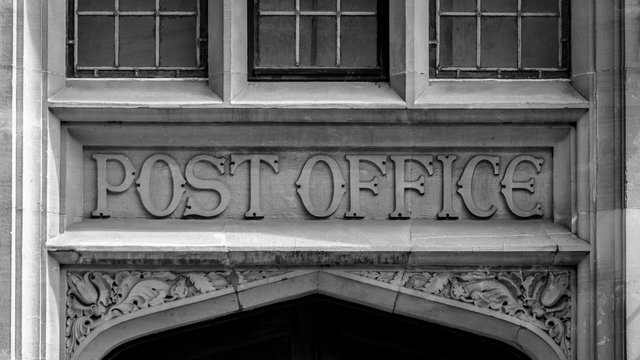 Post Office Carved in Stone above a door