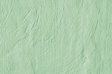 Light green background. Abstract painted wall.