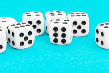 Gaming dices on blue background. Game concept.