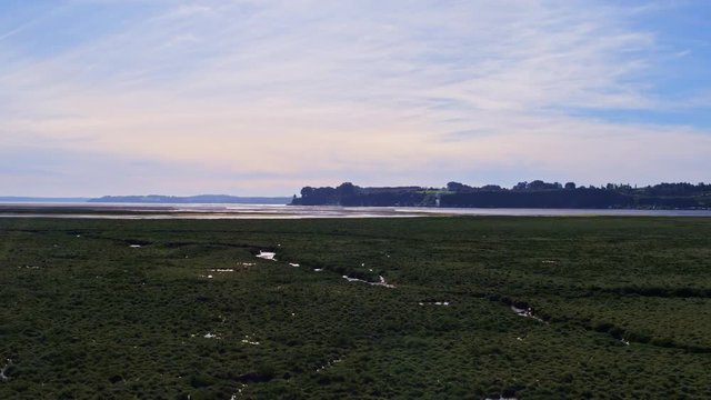 Aerial view of the surroundings of the community of Chamiza in the city of Puerto Montt on a sunny day with few clouds