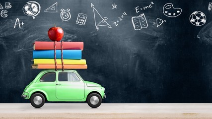 Back to school looped 4k animation. Car delivering books and apple against school blackboard with education symbols.