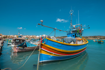 Obraz premium Marsaxlokk, Malta - Colourful fishing boats in Marsaxlokk