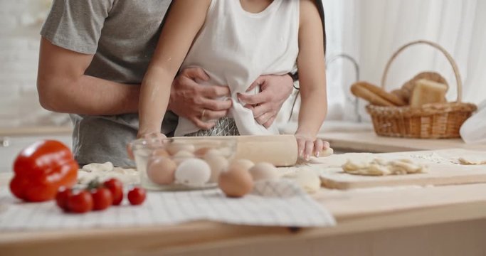 Cute Interracial Couple In Pajamas Is Cooking Their Lunch, Preparing Dough And Kidding Around, Spending Their Time Together - Recreational Pursuit, Togetherness 4k