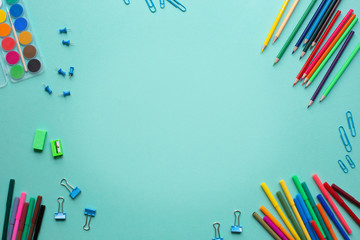 Stationary objects on color background. Place for your text. Concept back to school.