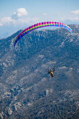Paragliding on the mountains. Extreme sport. Landscape