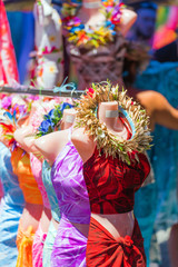 Mannequins in clothing in the local market, Rarotonga, Aitutaki, Cook Islands. With selective focus. Vertical.
