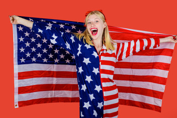 Make america great again! Independence Day. American flag. America. United states. USA. United states of America. US. July 4th. Summer. Happy woman covering by American flag.