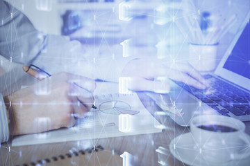 Businessman working on Laptop with technology theme drawing. Concept of big data. Double exposure.