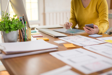 Designer women or Programmer drawing website UX layout app development