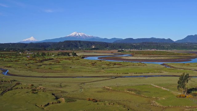 Aerial view of the surroundings of the community of Chamiza in the city of Puerto Montt on a sunny day with few clouds