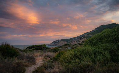 Sunset on the Rugged Coastline of Peniscola