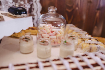 sweet festive buffet, fruit, caps, macaroni and lots of sweets