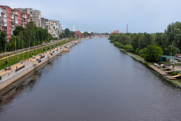 Cityview of the Pregolya River and the embankment of Admiral Tributs in center of Kaliningrad (former Konigsberg), Russia.