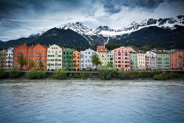 Fototapeta na wymiar Innsbruck waterfront with Alpine backdrop in Austria