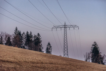 Electricity on a slope of Great Owl mountain in Owl Mountains Landscape Park, protected area in Lower Silesia Province of Poland