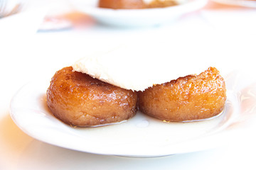 Turkish dessert Kemal Pasa with cream.