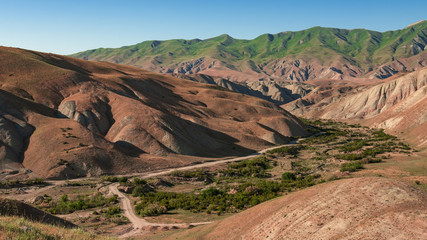 Amazing mountain landscape with a dirt road