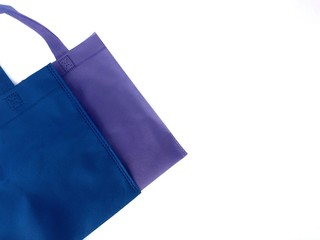 Blue and purple cloth bags .. Popular instead of plastic bags to help reduce global warming and be environmentally friendly.