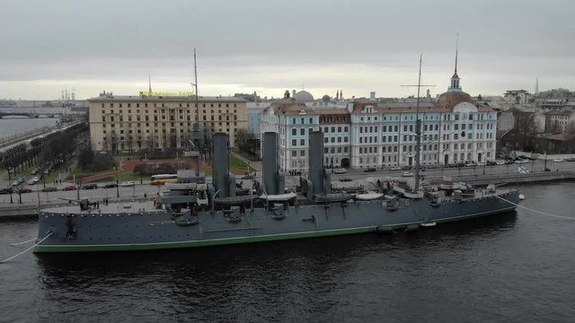 Aerial drone video with view of beautiful vintage architecture of St.-Petersburg, views of Neva River and old military cruiser