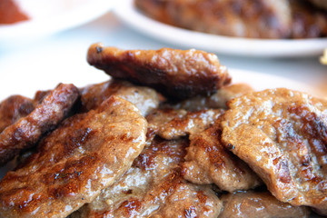 Turkish grilled meatballs on plate.