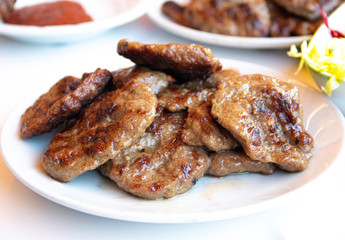 Turkish grilled meatballs on plate.