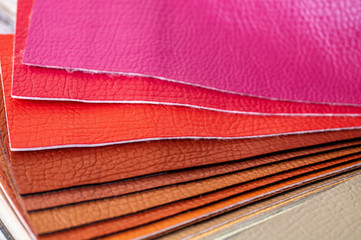 Catalog of multicolored imitation leather from matting fabric texture background, leatherette fabric texture. Industry background. 