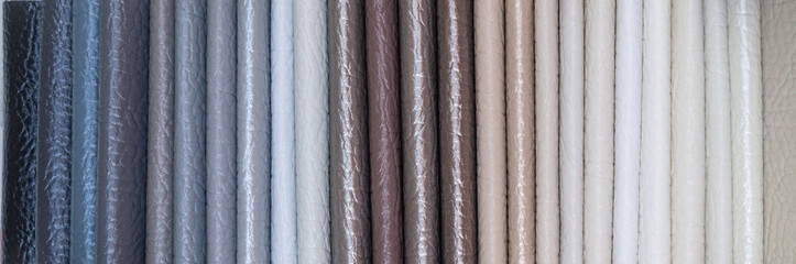 Catalog of multicolored imitation leather from matting fabric texture background, leatherette fabric texture. Industry background. 