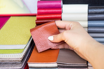 Catalog of multicolored imitation leather from matting fabric texture background, leatherette fabric texture. Industry background. 