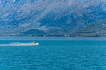 QUEENSTOWN, NEW ZEALAND - OCTOBER 10, 2018: Water bike on lake Wakatipu. Copy space for text.
