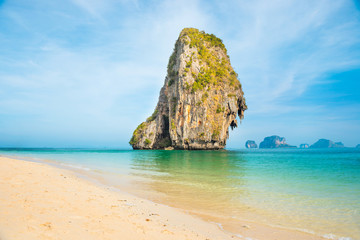Thailand landscape with tropical sea near sand beach and rock island on foreground and at horizon