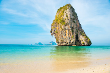 Thailand landscape with tropical sea near sand beach and rock island on foreground and at horizon