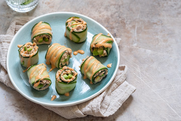 Cucumber roll with tuna, avocado and mayo chili sauce