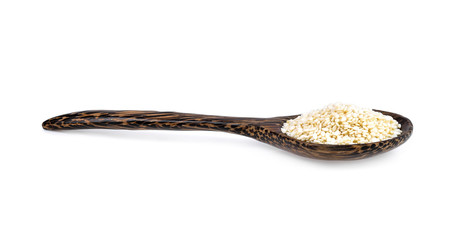 Quinua in wood spoon isolated on white background