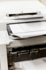 Industrial printer printing paper for custom order.