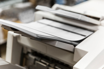 Industrial printer quickly creating documents for distribution. 